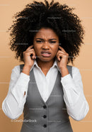 Frustrated Woman Covering Ears with Annoyed Expression
