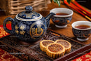 Elegant Chinese Tea Set with Mooncakes and Traditional Ceramics
