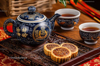 Elegant Chinese Tea Set with Mooncakes and Traditional Ceramics
