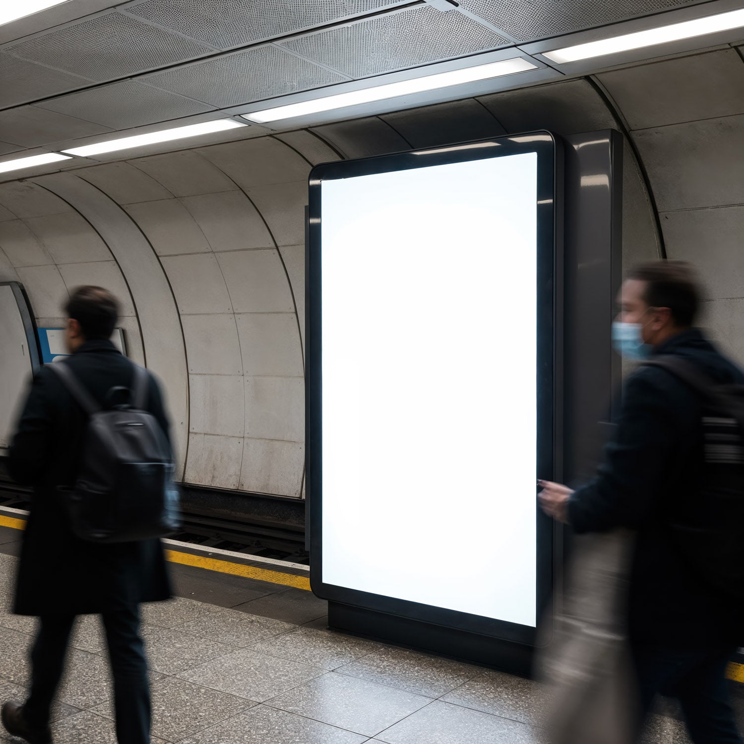 Blank advertising board in busy subway station