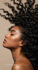 Profile of woman with voluminous curly hair on beige