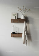 Minimalist Wall Decor with Wooden Shelves and Dried Branch