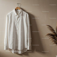 Crisp White Shirt Hanging on Wooden Hanger