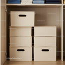 Stacked Beige Storage Bins in Modern Closet Organizing Space