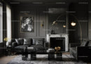 Modern living room with dark leather sofas and marble fireplace