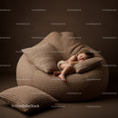 Toddler peacefully sleeping on oversized cozy bean bag