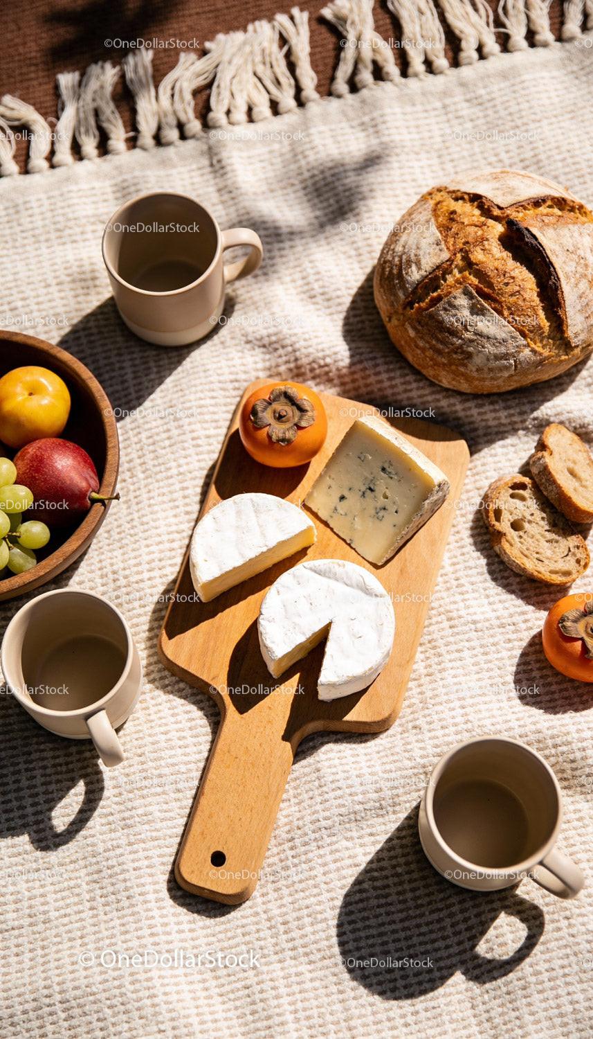 Cozy Autumn Picnic with Cheese Bread and Fresh Fruit