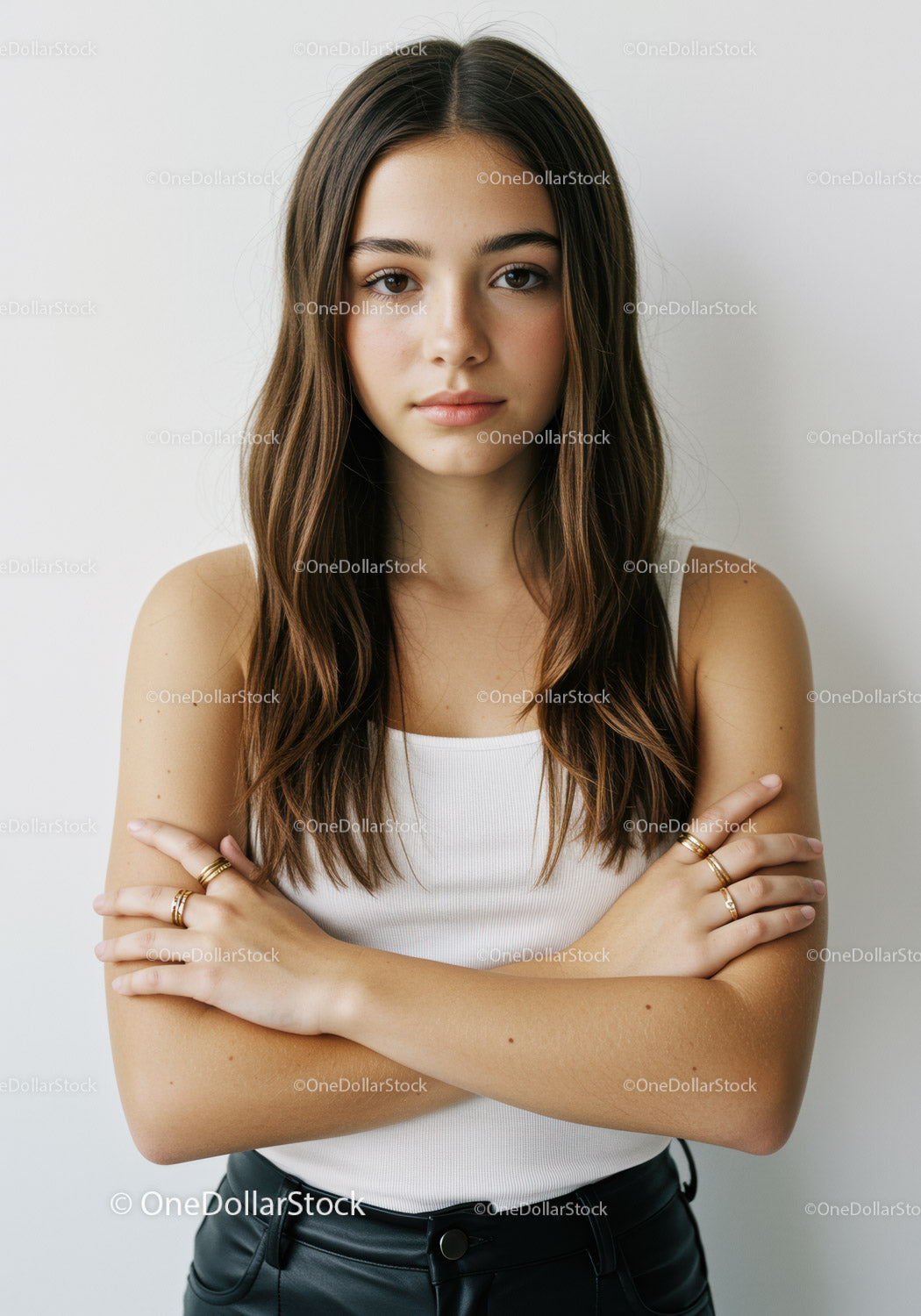 Confident Young Woman with Crossed Arms in Casual Style