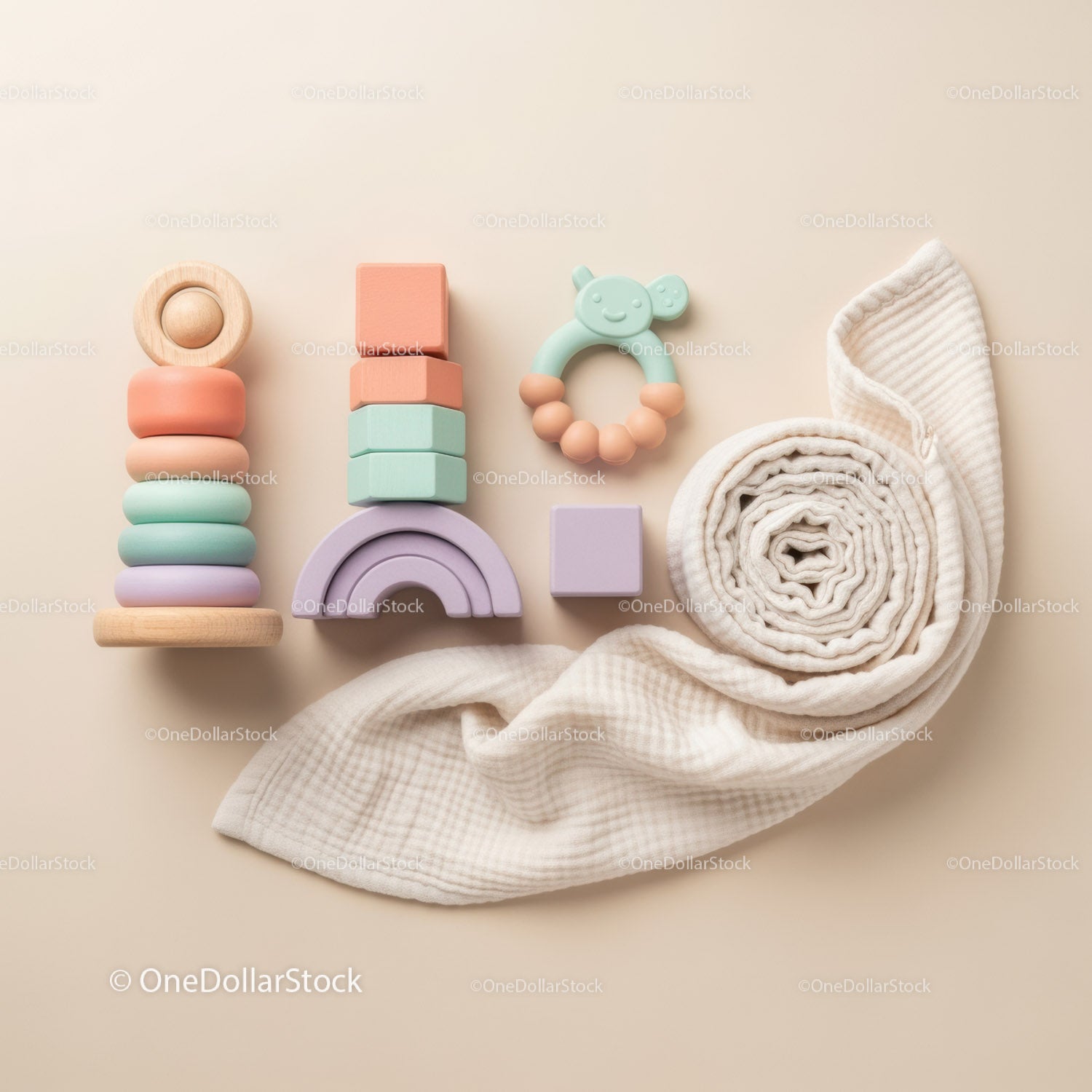 Neutral Toned Baby Toys and Soft Rolled Blanket