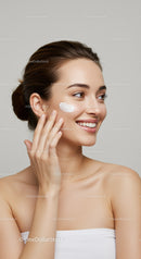 Young Woman Applying Face Cream for Healthy Glowing Skin