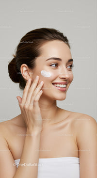 Young Woman Applying Face Cream for Healthy Glowing Skin