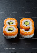 Salmon Avocado Sushi Rolls on Black Slate Plate