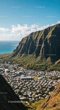 Scenic Mountain Range Overlooking a Vibrant Coastal City