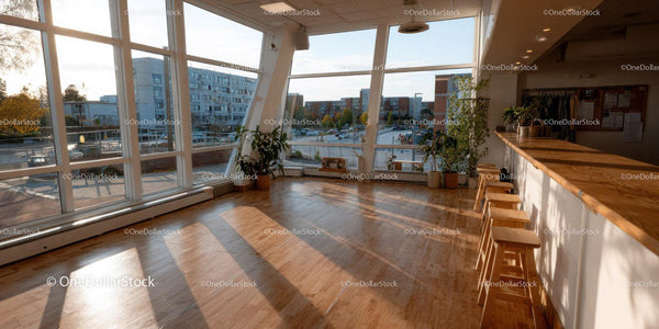 Bright Modern Cafe Interior with Large Windows and City View