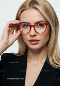Elegant Blonde Woman Wearing Red Glasses in Professional Portrait