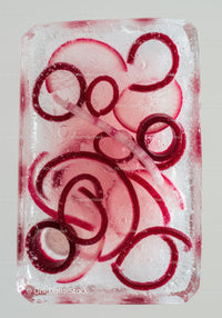 Red Onion Rings Frozen Inside Clear Ice Cube