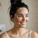 Young Woman with Freckles and Clear Skin Smiling Portrait