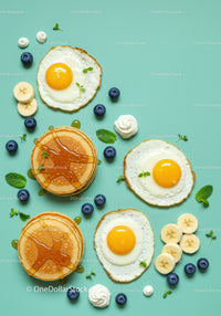 Sunny side up eggs with pancakes and fresh fruit