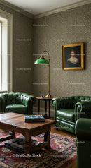 Cozy vintage sitting area with green leather armchairs