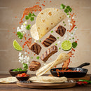Grilled steak tacos with fresh lime and cilantro