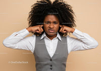 Frustrated Woman Covering Ears with Annoyed Expression