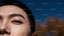 Close up of serene young person with natural skin