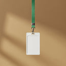 Blank white ID badge with green lanyard on brown background
