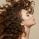 Profile of young woman with flowing curly hair