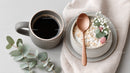 Rustic Ceramic Coffee and Oatmeal Bowl with Raspberries and Flowers