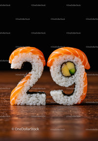 Creative sushi shaped as number twenty nine on wood