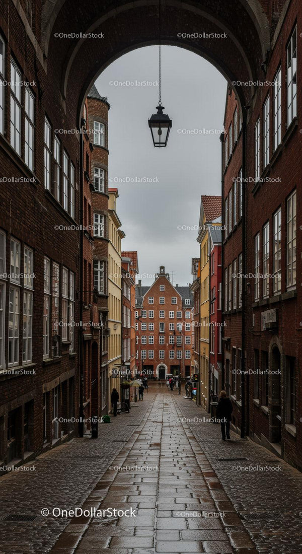 Charming European Old Town Street with Historic Brick Buildings and Cobblestone Path