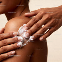 Applying Moisturizing Cream on Smooth Shoulder Skin