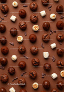 Assorted chocolate truffles and marshmallows on brown background