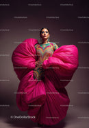 Fashion Model in Vibrant Pink and Yellow Flowing Gown