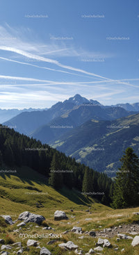 Majestic Mountain Range with Lush Green Forest and Rocky Terrain
