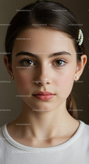 Elegant Young Woman with Brown Eyes and Pearl Hairpin