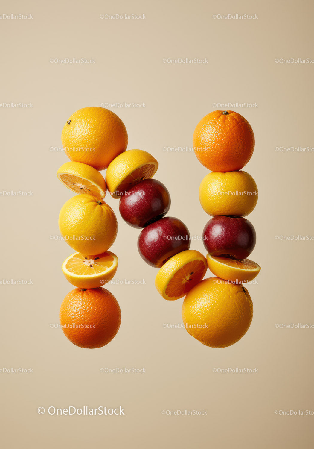 Creative letter N made of fresh citrus and apples