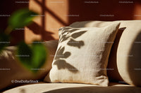 Beige Cushion on Sofa with Soft Texture and Shadow Play