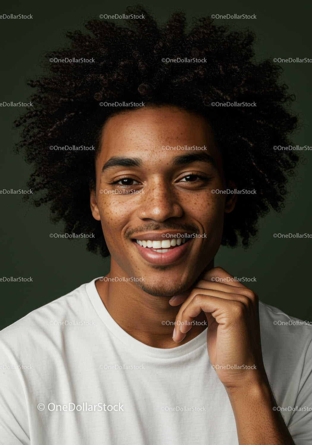 Close-up of Happy Young Man with Curly Hair and Bright Smile