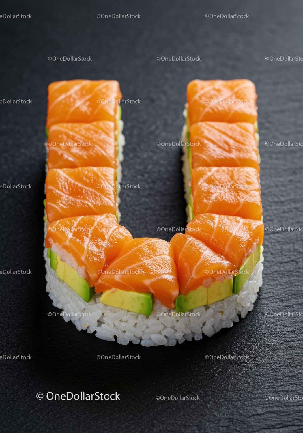 Sushi roll shaped like the letter U with salmon
