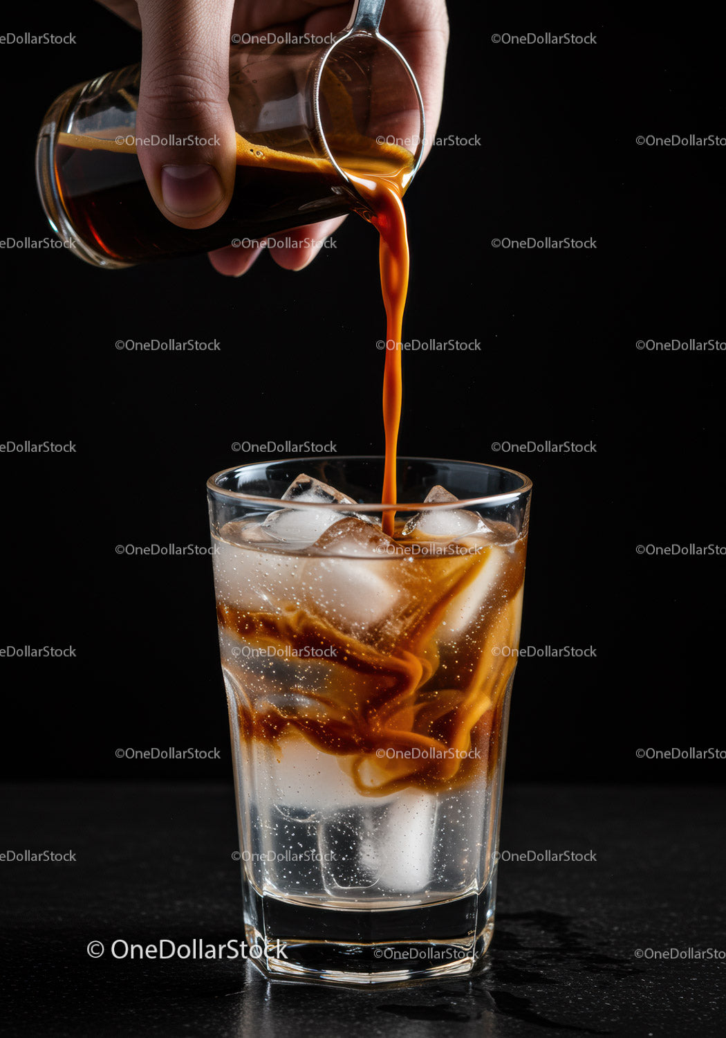 Cold sparkling drink with coffee poured over ice