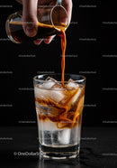 Cold sparkling drink with coffee poured over ice
