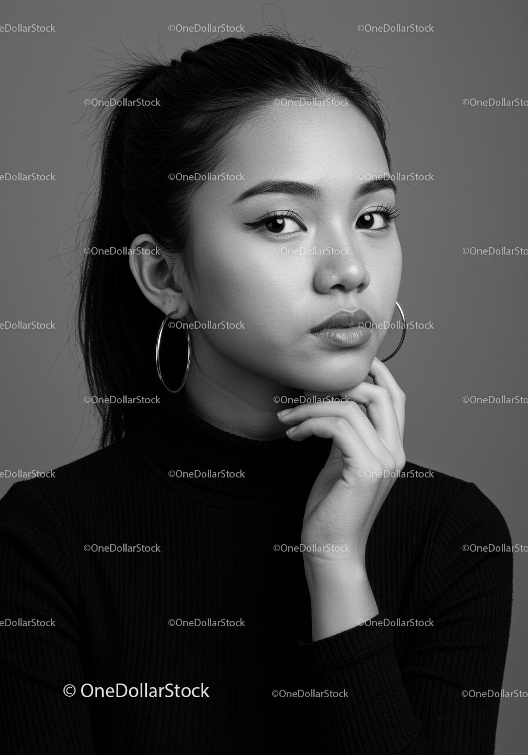 Elegant Black and White Portrait of a Confident Young Woman