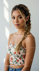 Beautiful Young Woman with Braided Hairstyle Wearing Floral Crop Top