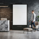 Modern office lobby with marble reception and seating area