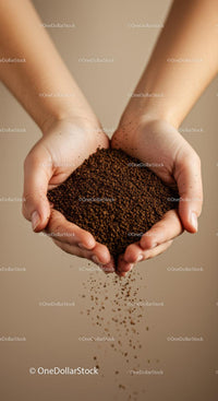 Hands gently holding and pouring instant coffee granules