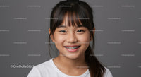 Young Smiling Girl with Braces and Happy Expression