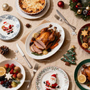 Festive Christmas Dinner Table with Roast Turkey and Sweets