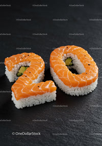 Creative sushi shaped as number 20 on black background