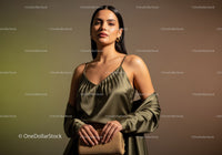 Elegant Woman Wearing Silk Top and Beige Dress with Sophisticated Style